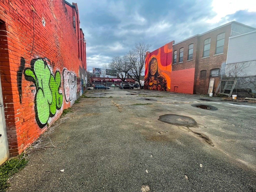 349-351 Main Street Holyoke, MA 01040 - Photo 4 of 7 a view of a street with buildings