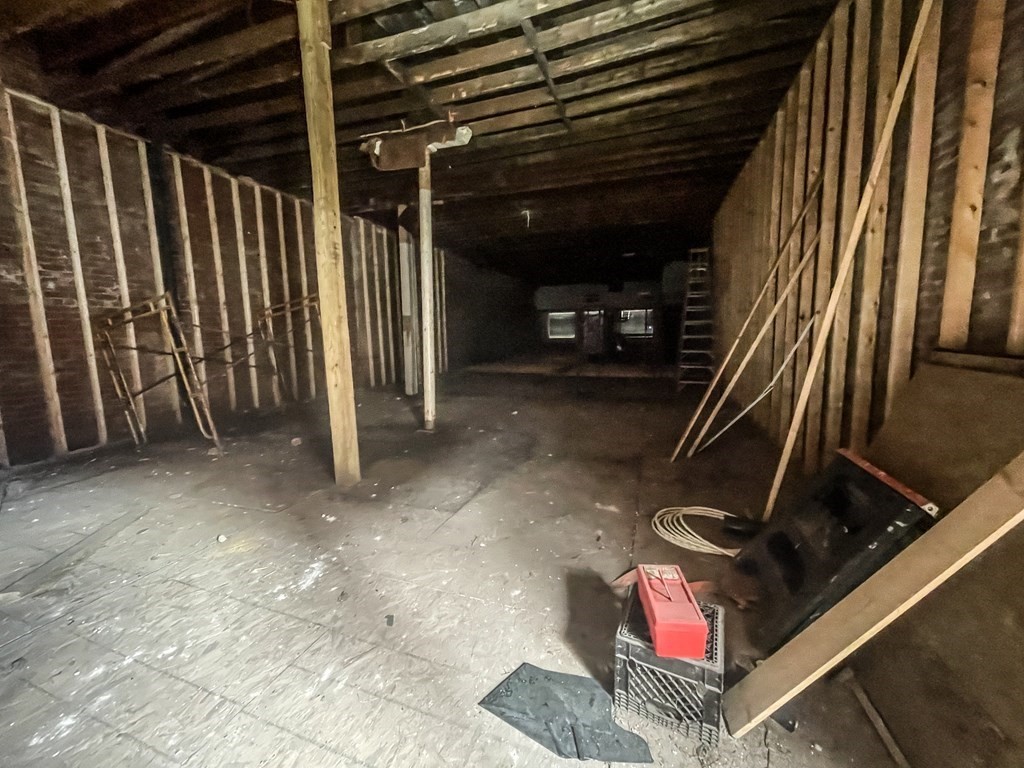 349-351 Main Street Holyoke, MA 01040 - Photo 6 of 7 a view of an empty room with wooden floor