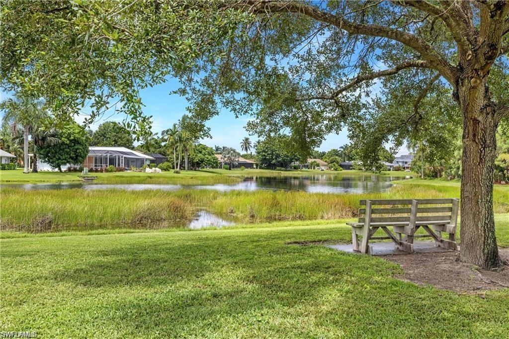 2252 Royal Lane Naples, FL 34112 - Photo 31 of 42 Surrounding community featuring a water view and a yard