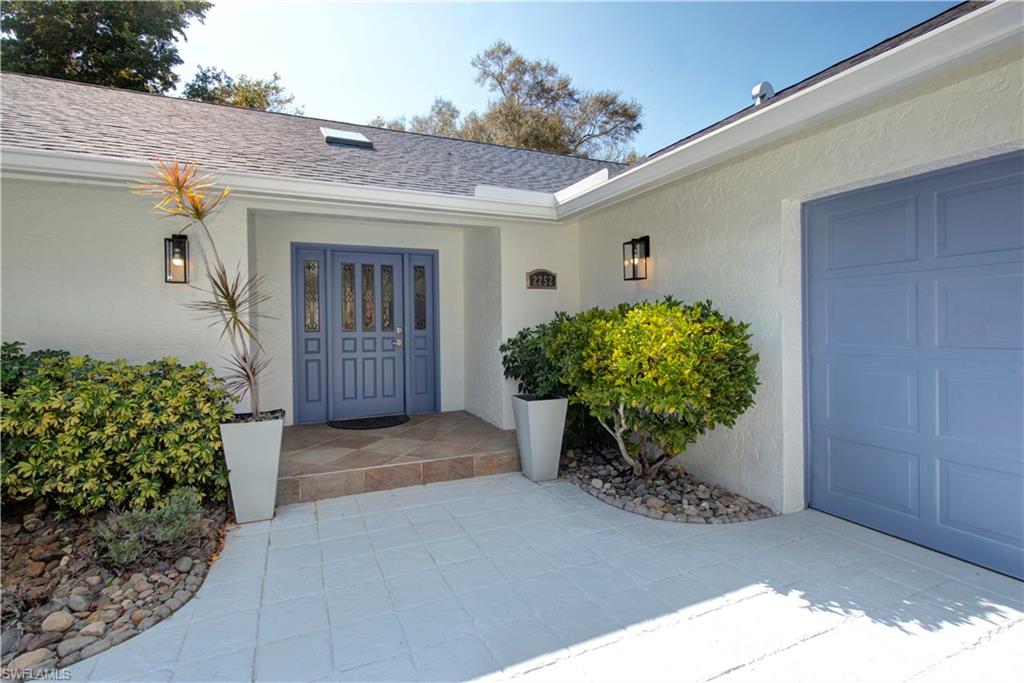 2252 Royal Lane Naples, FL 34112 - Photo 42 of 42 Entrance to property with NEW roof and stucco siding