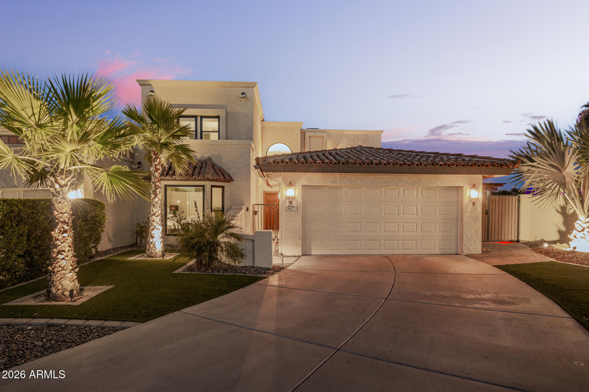 4655 East Monte Way Phoenix, AZ 85044 - Photo 70 of 74 a front view of a house with a yard