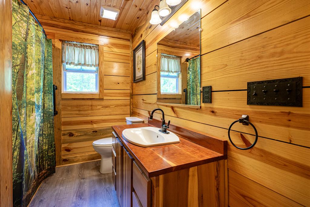 153 North Whatley Road LaGrange, GA 30240 - Photo 32 of 67 a bathroom with a sink and a mirror