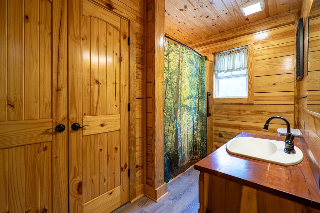 153 North Whatley Road LaGrange, GA 30240 - Photo 33 of 67 a bathroom with a sink and a mirror