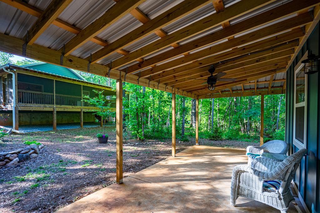 153 North Whatley Road LaGrange, GA 30240 - Photo 44 of 67 a view of a patio with a table chairs and a backyard