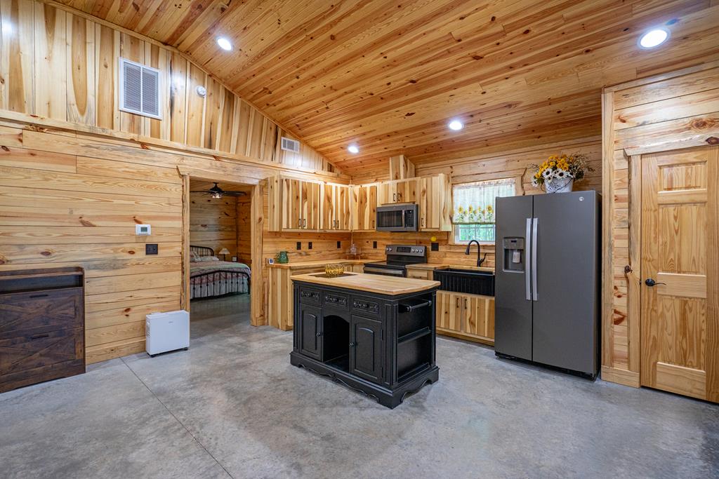 153 North Whatley Road LaGrange, GA 30240 - Photo 50 of 67 a kitchen with stainless steel appliances granite countertop a stove a refrigerator and a refrigerator