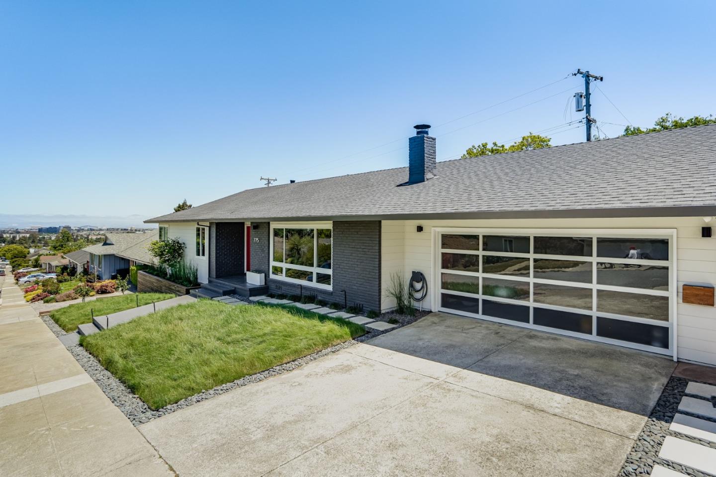 775 Pico Avenue San Mateo, CA 94403 - Photo 2 of 66 a front view of a house with a yard and garage