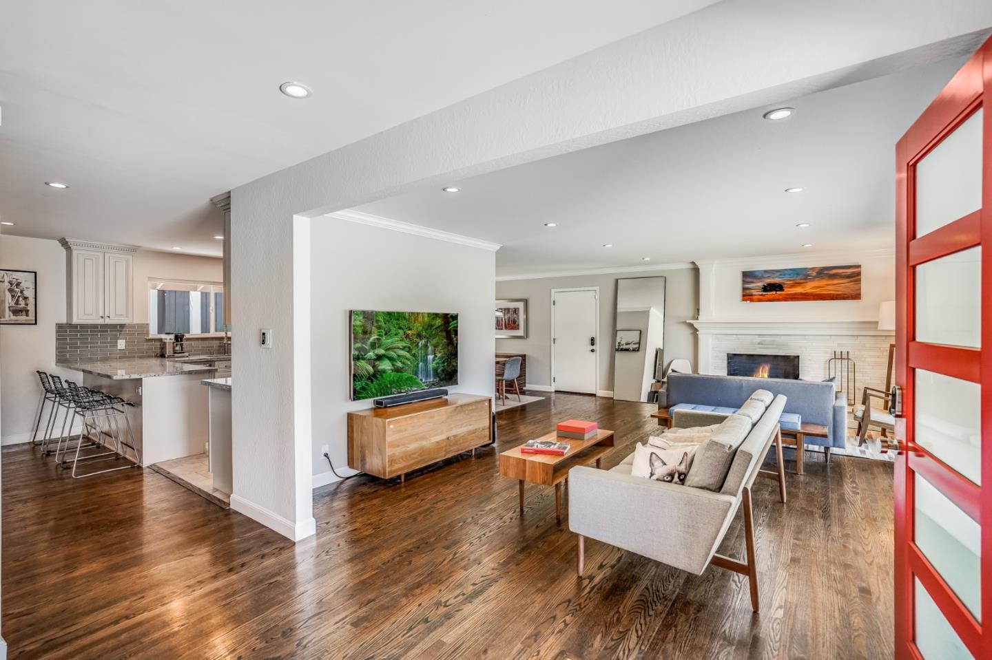 775 Pico Avenue San Mateo, CA 94403 - Photo 12 of 66 a living room with fireplace furniture and a wooden floor