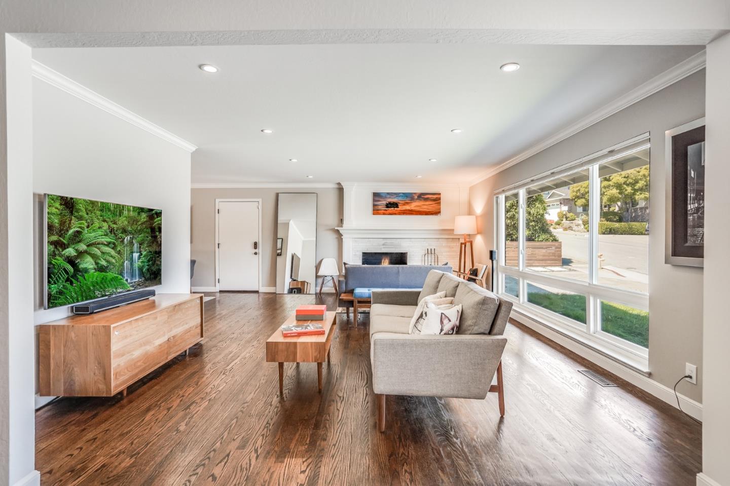 775 Pico Avenue San Mateo, CA 94403 - Photo 13 of 66 a living room with fireplace furniture and a flat screen tv