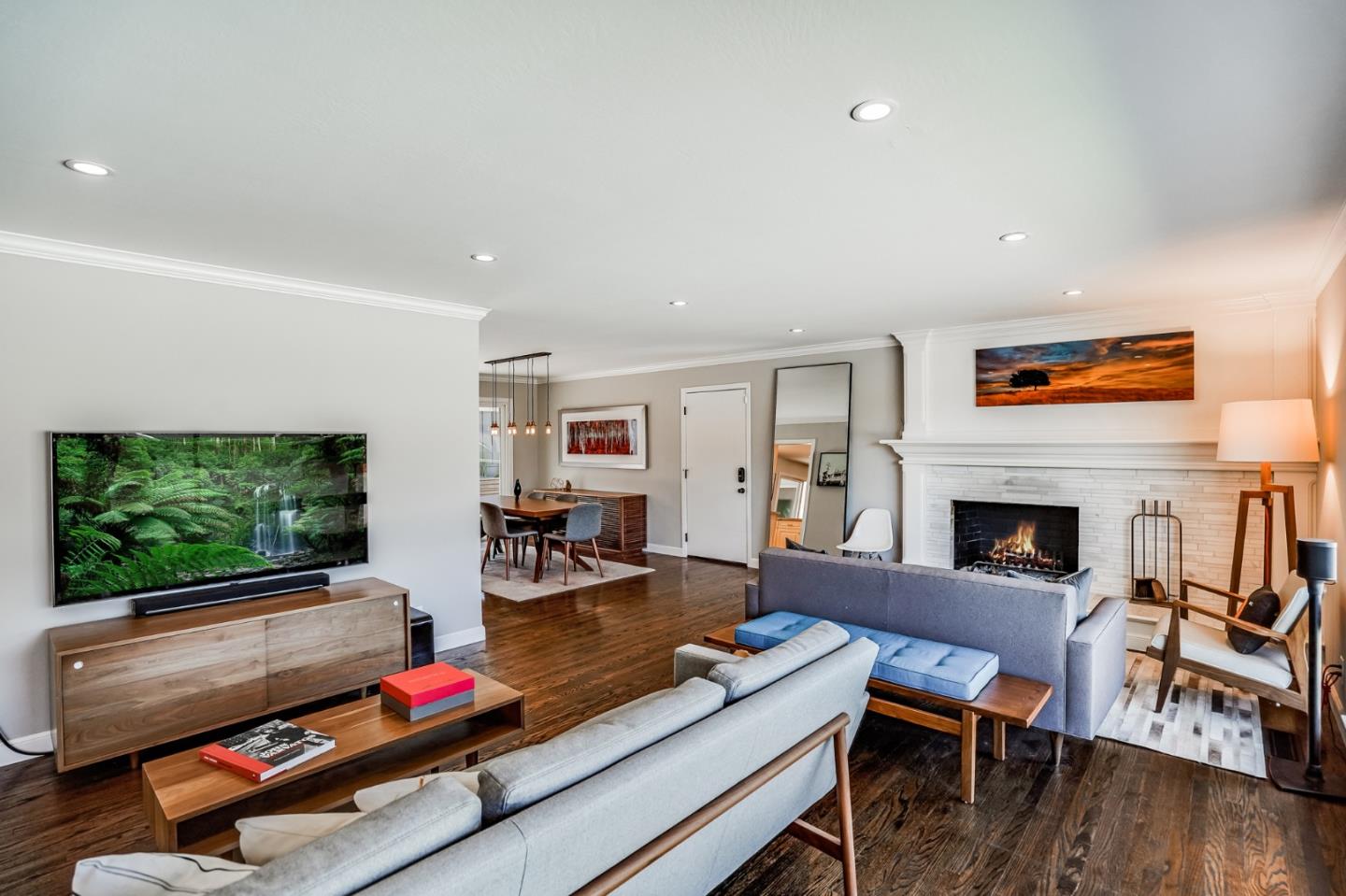 775 Pico Avenue San Mateo, CA 94403 - Photo 14 of 66 a living room with furniture a flat screen tv and a fireplace