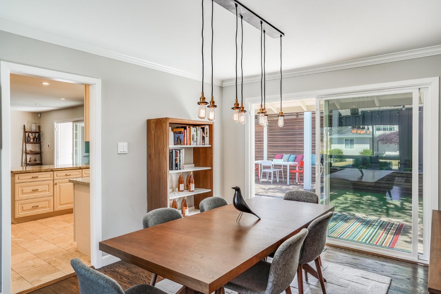 775 Pico Avenue San Mateo, CA 94403 - Photo 17 of 66 a view of a dining room with furniture window and wooden floor