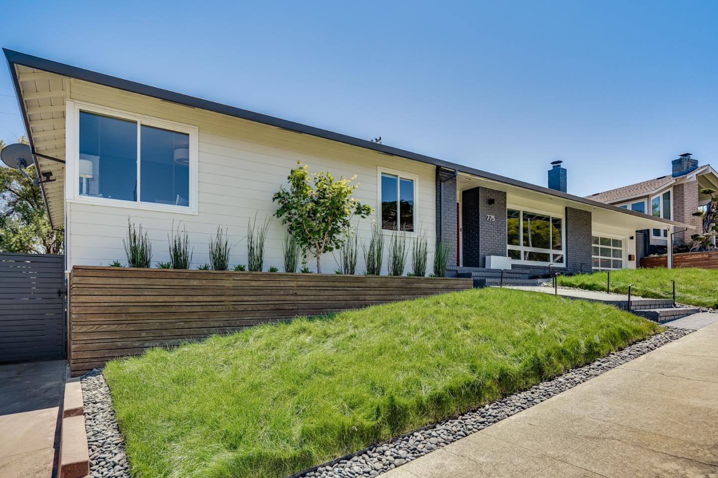 775 Pico Avenue San Mateo, CA 94403 - Photo 3 of 66 a front view of a house with a yard