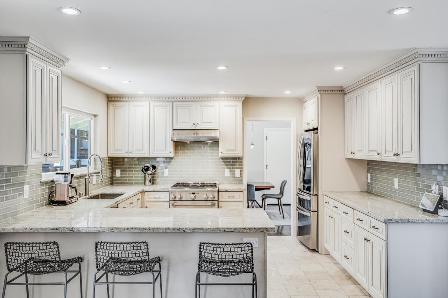 775 Pico Avenue San Mateo, CA 94403 - Photo 22 of 66 a kitchen with stainless steel appliances granite countertop a sink and cabinets