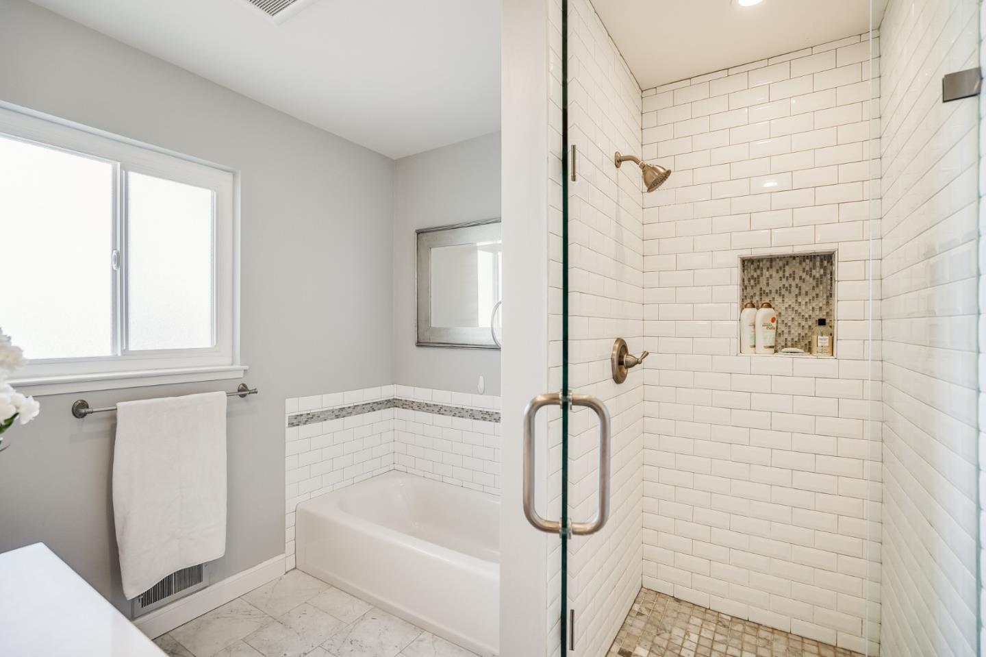 775 Pico Avenue San Mateo, CA 94403 - Photo 32 of 66 a bathroom with a bathtub and a shower