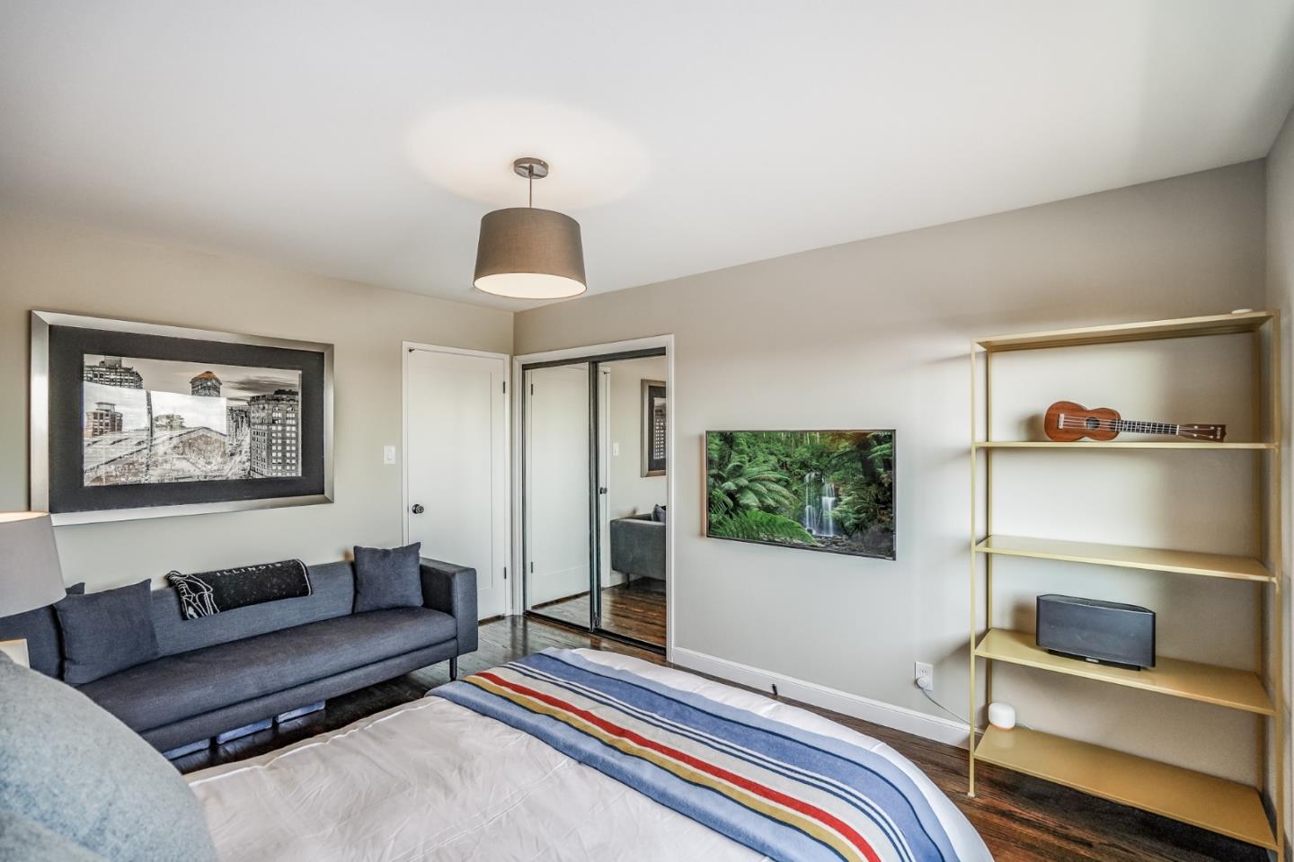 775 Pico Avenue San Mateo, CA 94403 - Photo 35 of 66 a living room with furniture and a flat screen tv