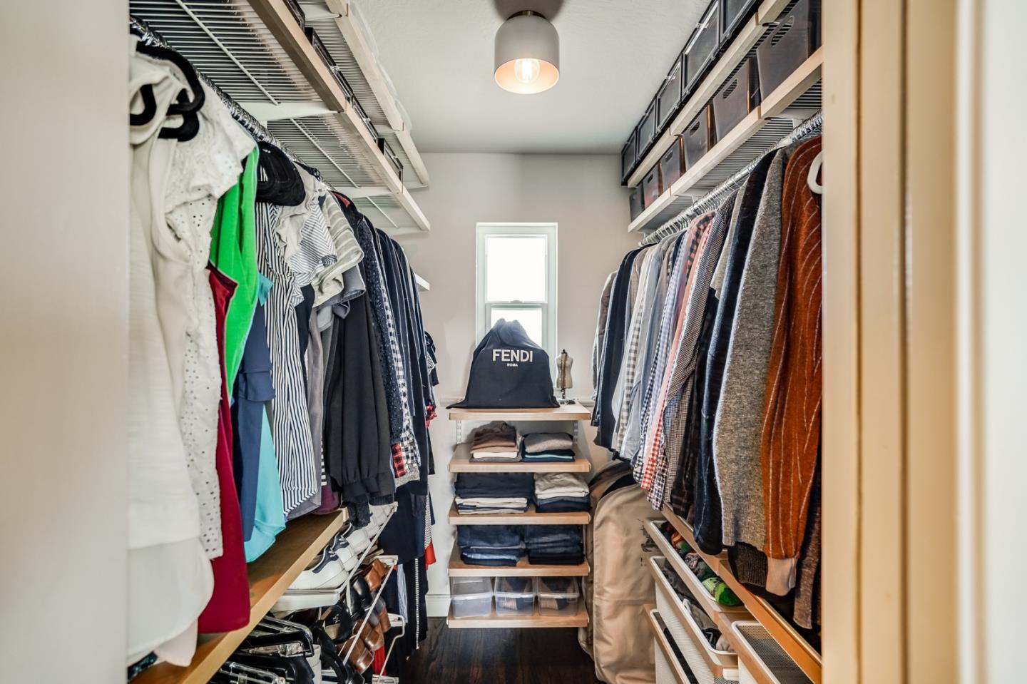 775 Pico Avenue San Mateo, CA 94403 - Photo 43 of 66 a view of walk in closet with clothes and shoes