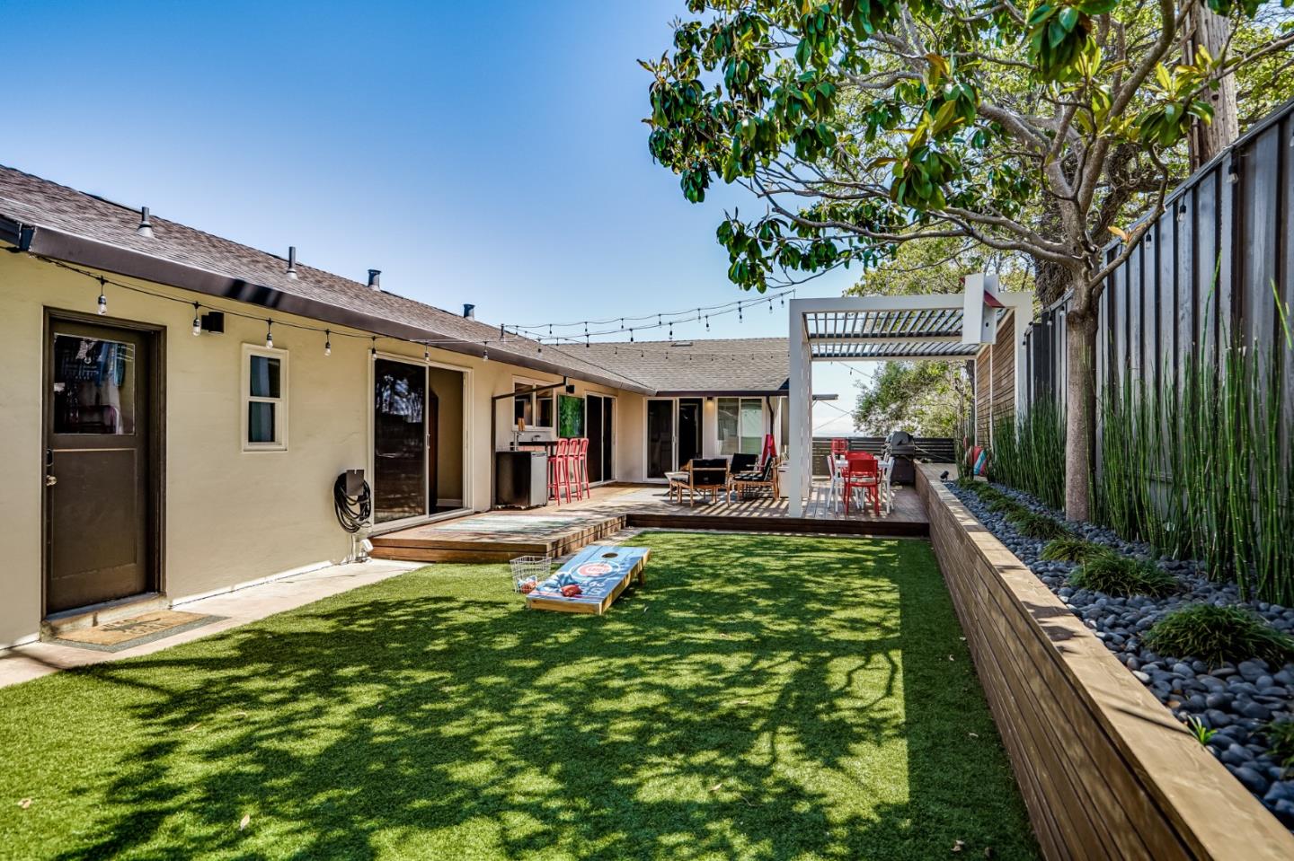 775 Pico Avenue San Mateo, CA 94403 - Photo 48 of 66 a view of a house with backyard swimming pool and sitting area