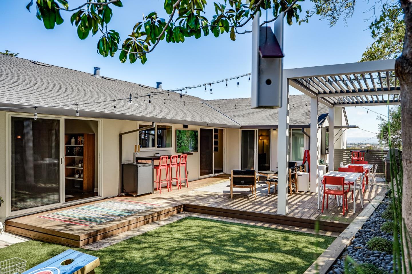 775 Pico Avenue San Mateo, CA 94403 - Photo 49 of 66 a view of a house with sitting area and garden