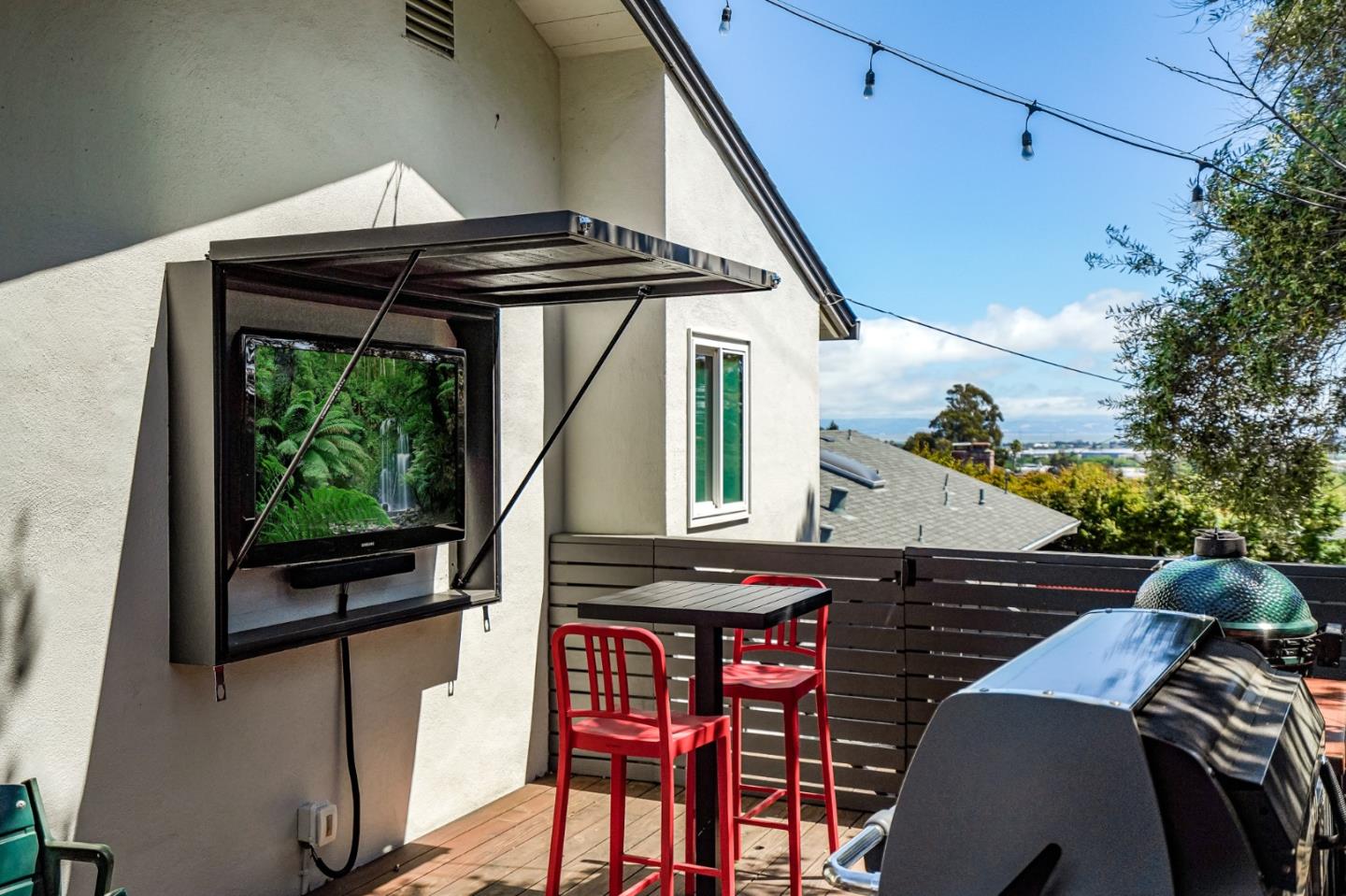 775 Pico Avenue San Mateo, CA 94403 - Photo 51 of 66 a view of balcony with wooden floor and outdoor seating