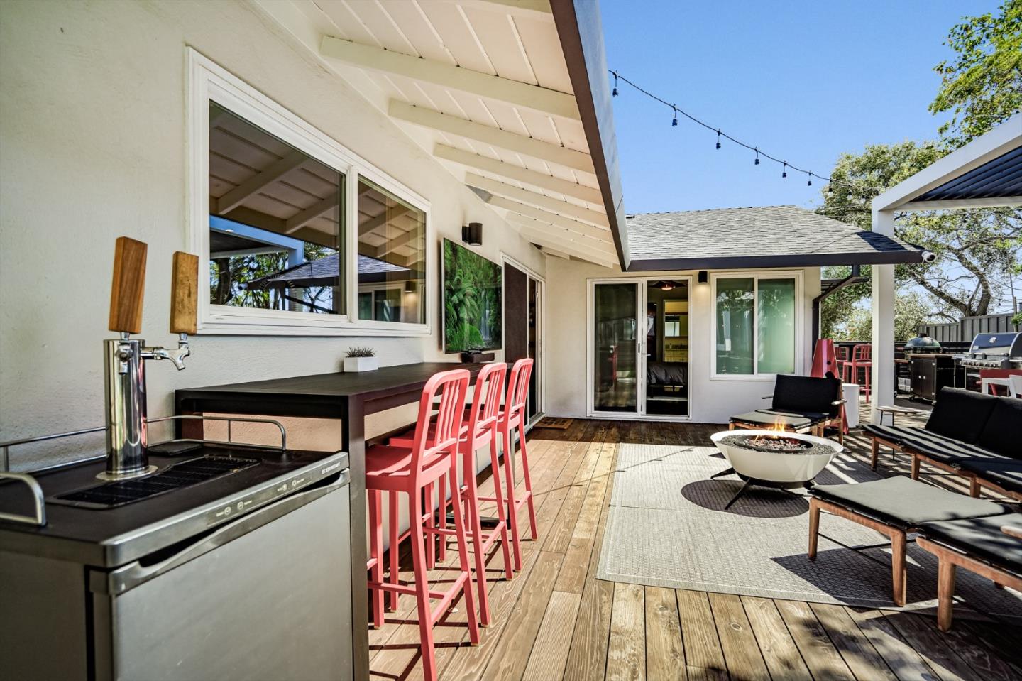 775 Pico Avenue San Mateo, CA 94403 - Photo 55 of 66 a outdoor space with patio the couches and a fireplace with the potted plants