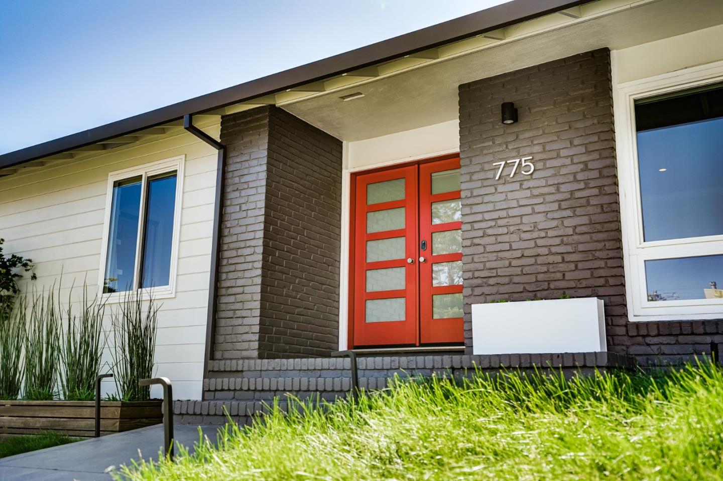 775 Pico Avenue San Mateo, CA 94403 - Photo 10 of 66 a front view of a house with a yard