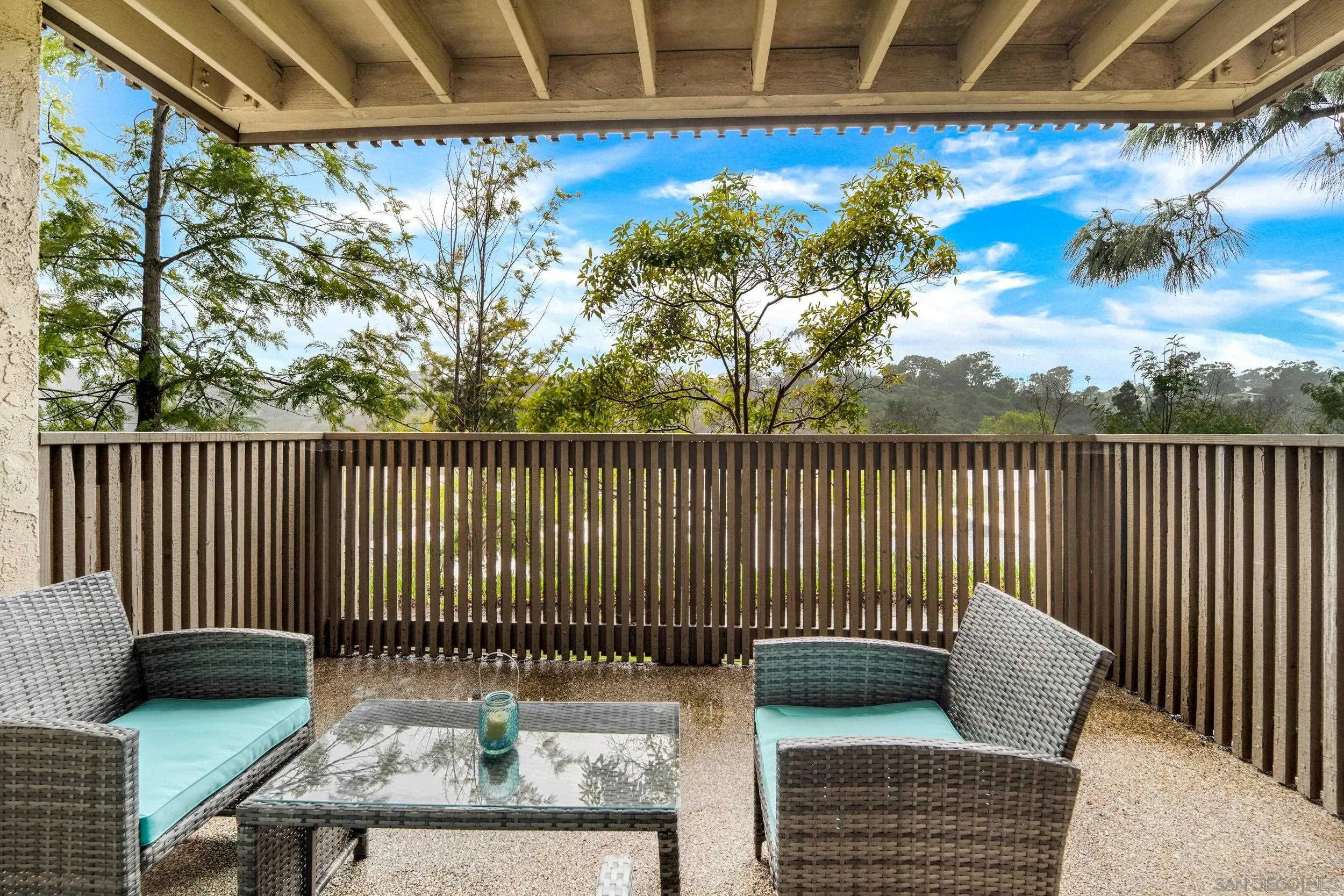 8640 Via Mallorca, Unit A La Jolla, CA 92037 - Photo 1 of 24 a balcony with a couch