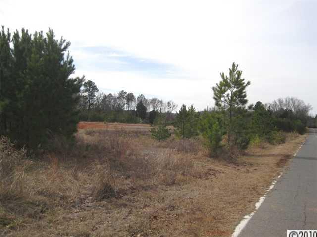 0 Helms Road Lancaster, SC 29720 - Photo 8 of 9 a view of a dirt road with trees in the background