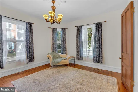 a kitchen with stainless steel appliances granite countertop a stove a refrigerator and a microwave