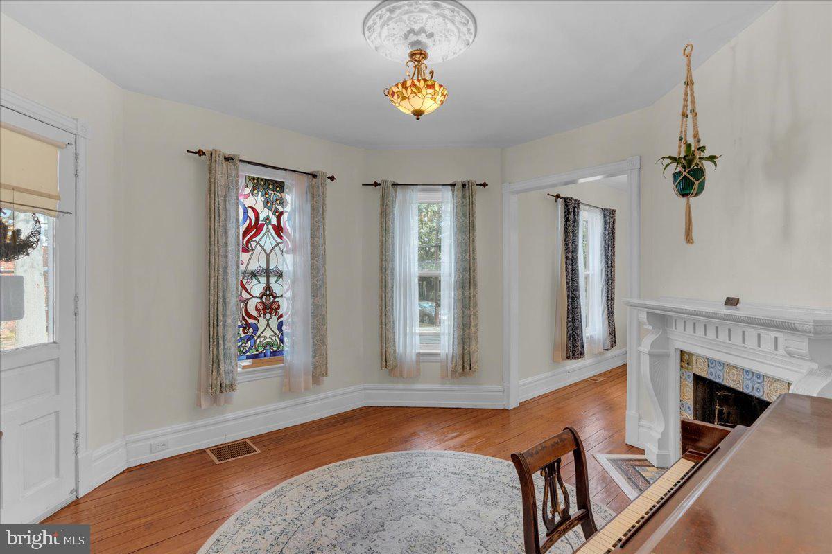 45 Broad Street Mount Holly, NJ 08060 - Photo 30 of 58 a view of hall way with furniture and fireplace