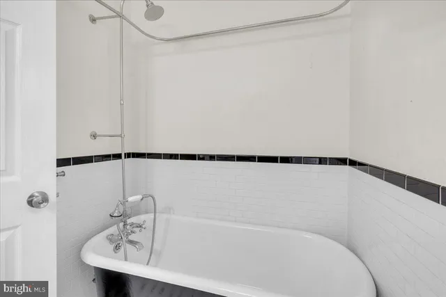 a picture of a room with a white wall and a white wall