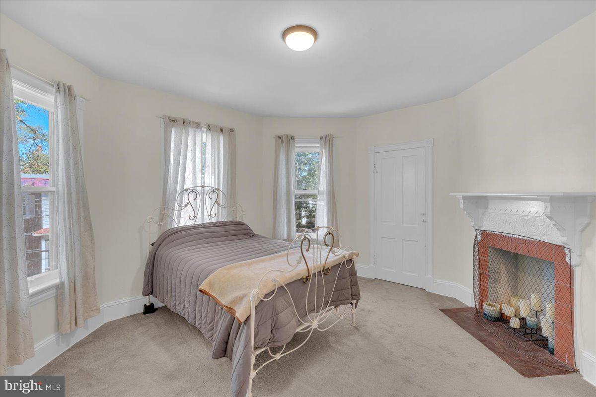 45 Broad Street Mount Holly, NJ 08060 - Photo 40 of 58 a bedroom with a bed and a window