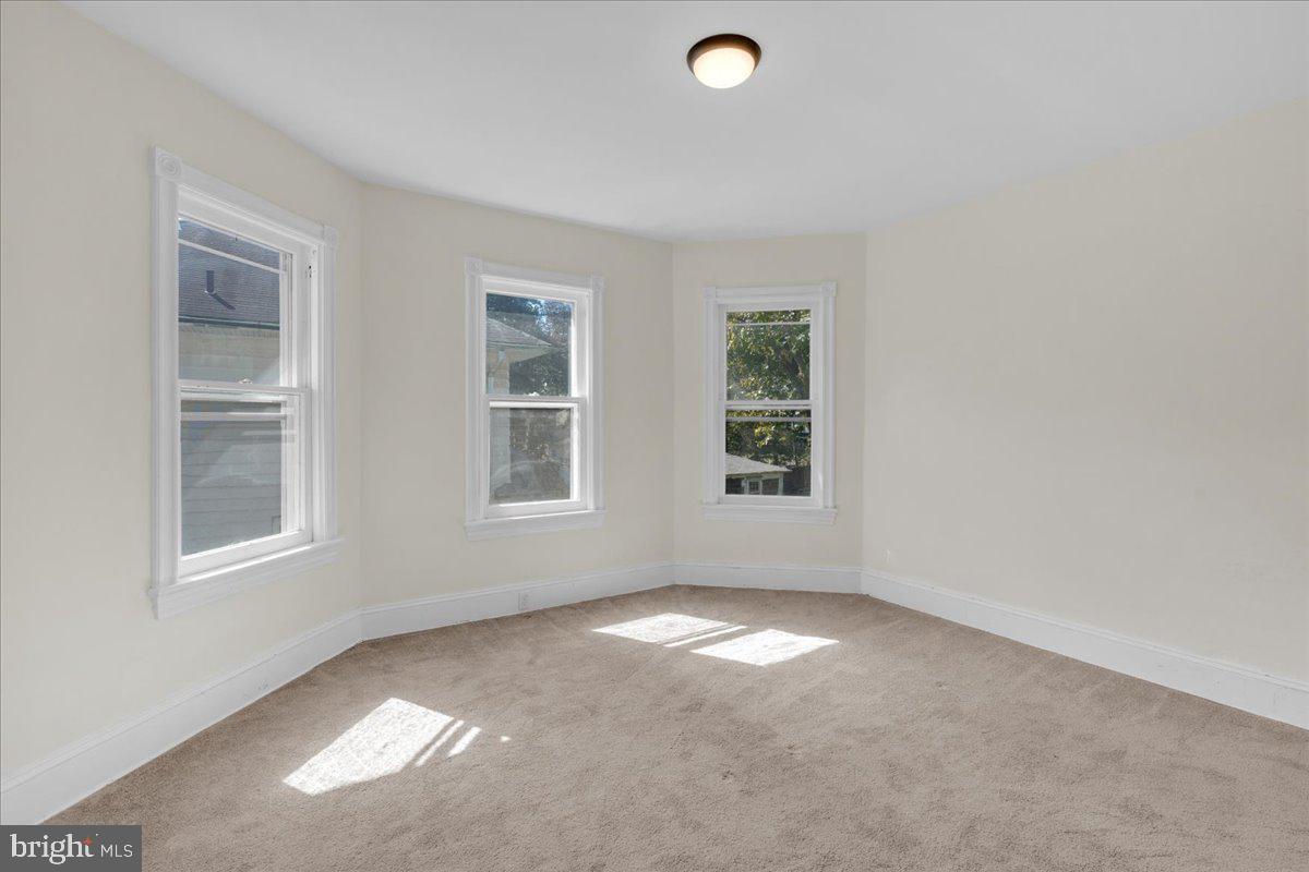 45 Broad Street Mount Holly, NJ 08060 - Photo 42 of 58 an empty room with windows