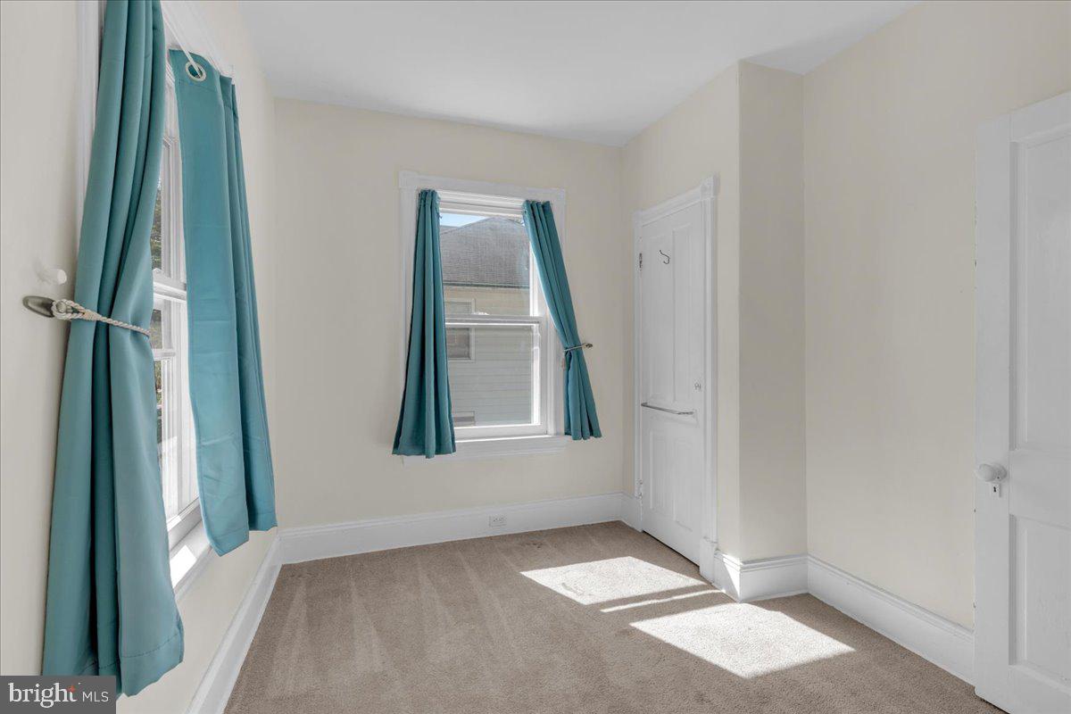 45 Broad Street Mount Holly, NJ 08060 - Photo 49 of 58 an empty room with windows