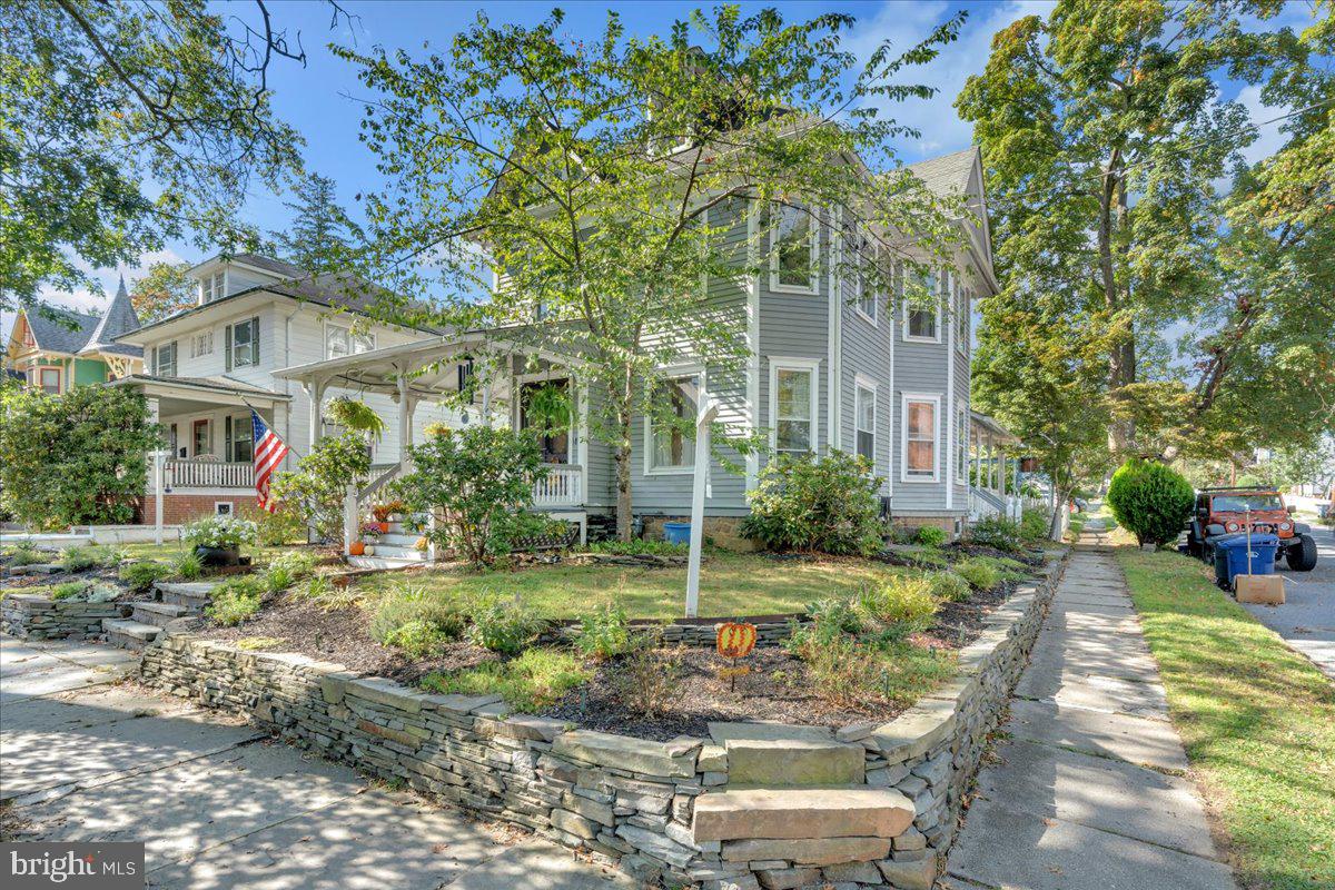 45 Broad Street Mount Holly, NJ 08060 - Photo 6 of 58 a front view of a house with garden
