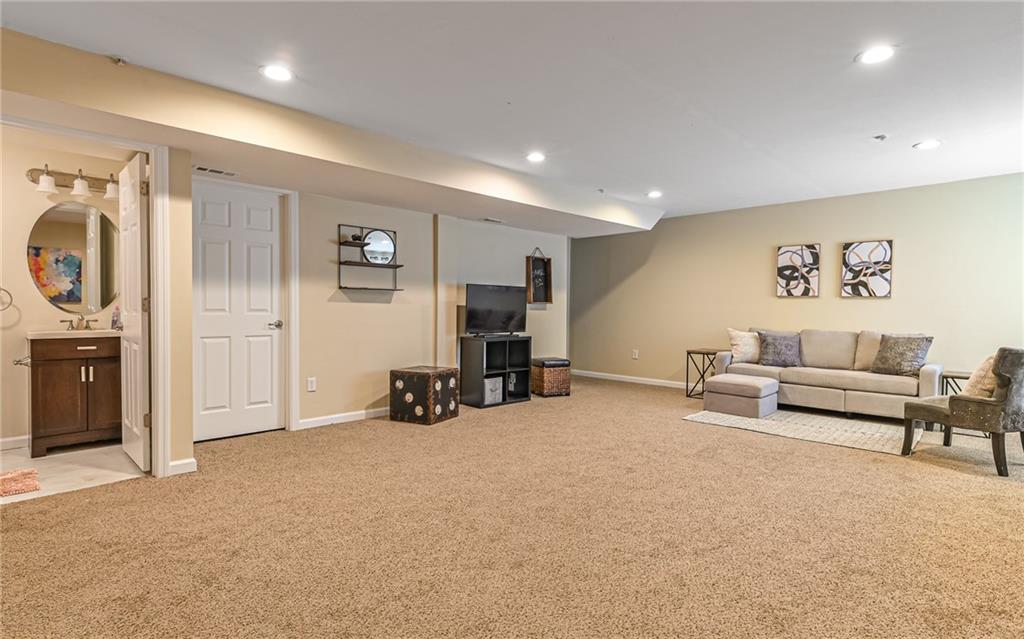 205 Broadstone Drive Mars, PA 16046 - Photo 20 of 24 a view of a livingroom with furniture and a ceiling fan