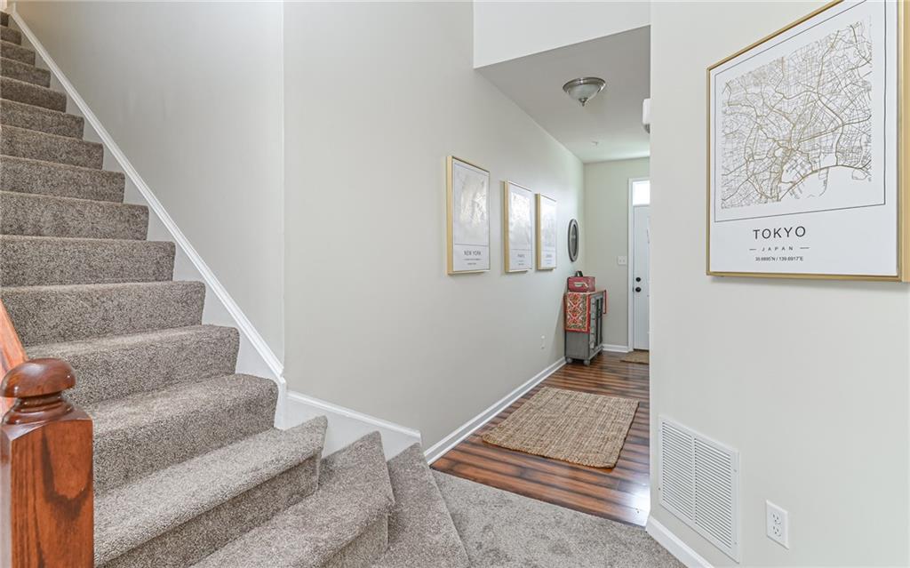 205 Broadstone Drive Mars, PA 16046 - Photo 2 of 24 a living room with furniture and stairs