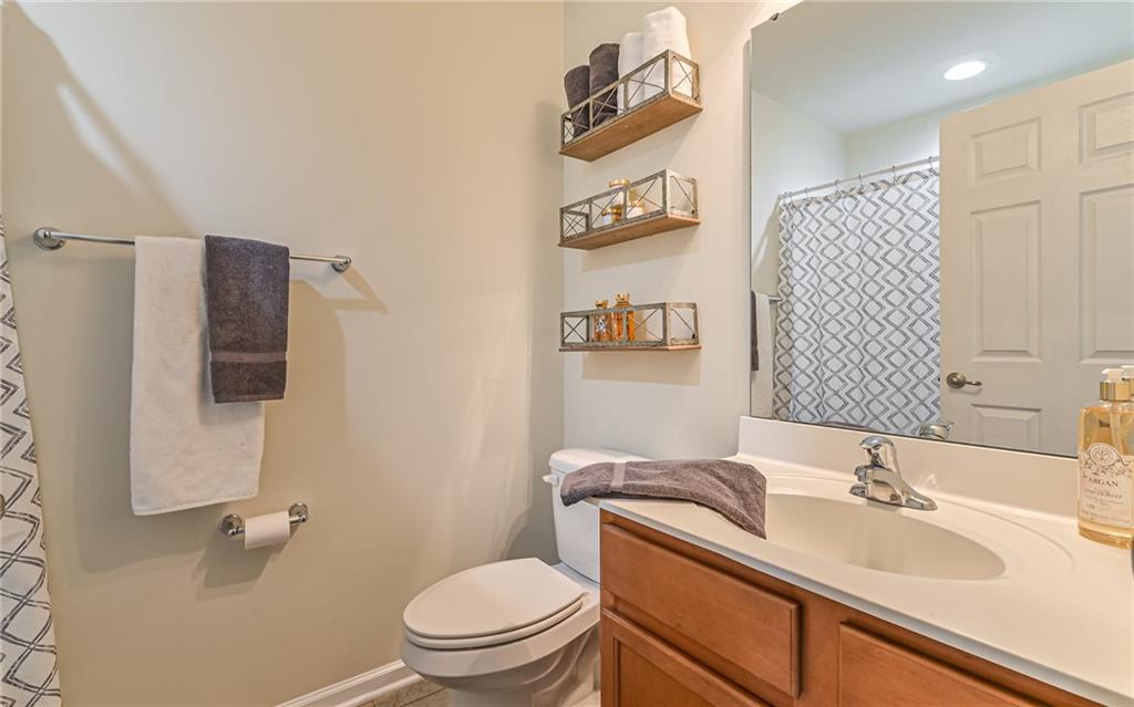 205 Broadstone Drive Mars, PA 16046 - Photo 21 of 24 a bathroom with a sink toilet and shower