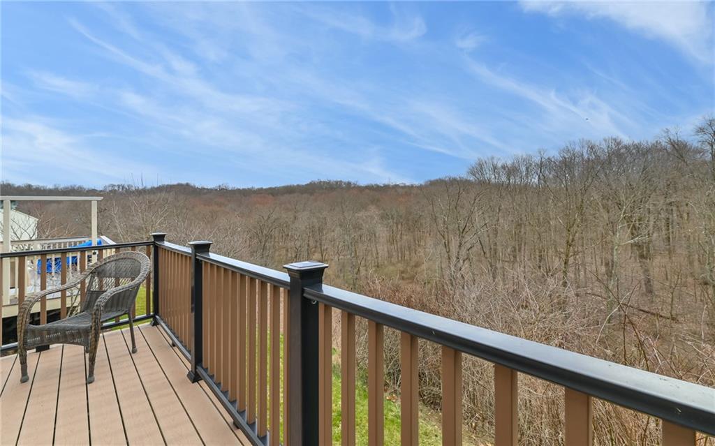 205 Broadstone Drive Mars, PA 16046 - Photo 23 of 24 a view of balcony with wooden floor and fence