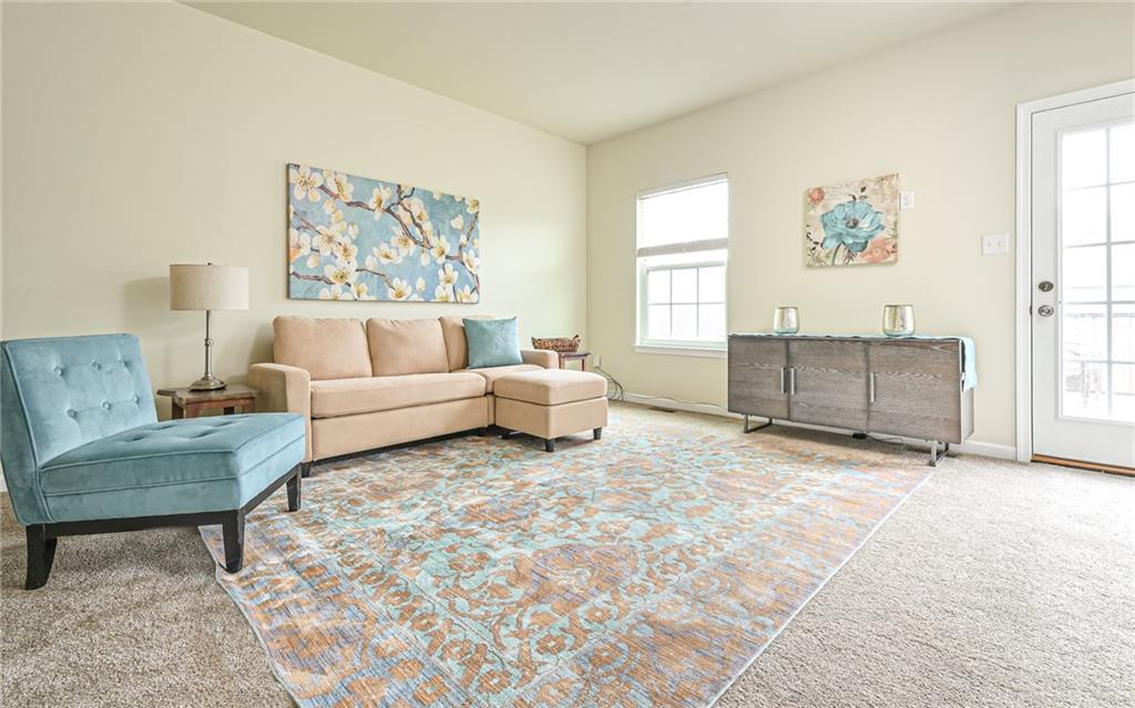 205 Broadstone Drive Mars, PA 16046 - Photo 4 of 24 a living room with furniture and a window