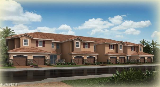 15335 Lucerna Street, Unit 201 Naples, FL 34114 - Photo 1 of 11 a front view of residential houses with yard