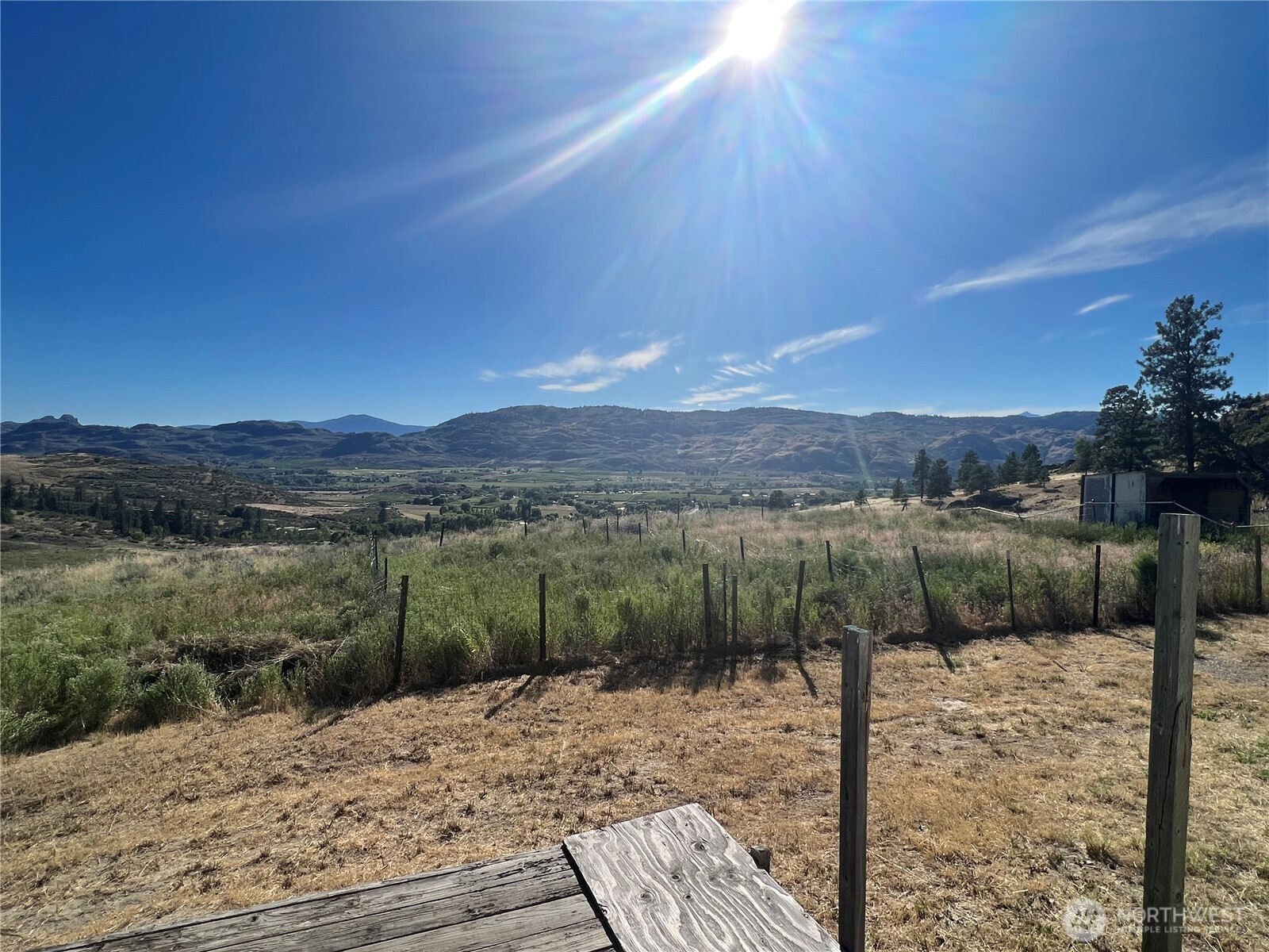 105 Swanson Mill Road Oroville, WA 98844 - Photo 16 of 37 a view of a lake in a city