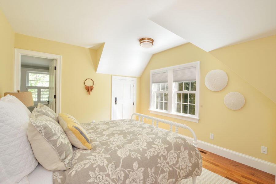 71 Sand Point Osterville, MA 02655 - Photo 38 of 45 a bedroom with a bed and a painting on the wall
