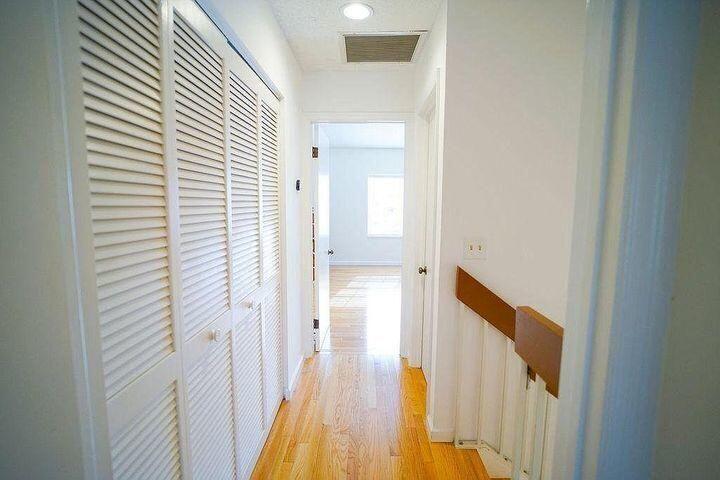 1511 Ocean Dunes Circle, Unit 1511 Jupiter, FL 33477 - Photo 15 of 27 a view of a hallway with wooden floor