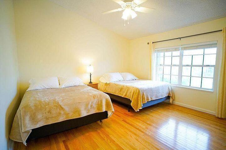 1511 Ocean Dunes Circle, Unit 1511 Jupiter, FL 33477 - Photo 16 of 27 a bedroom with bed and window