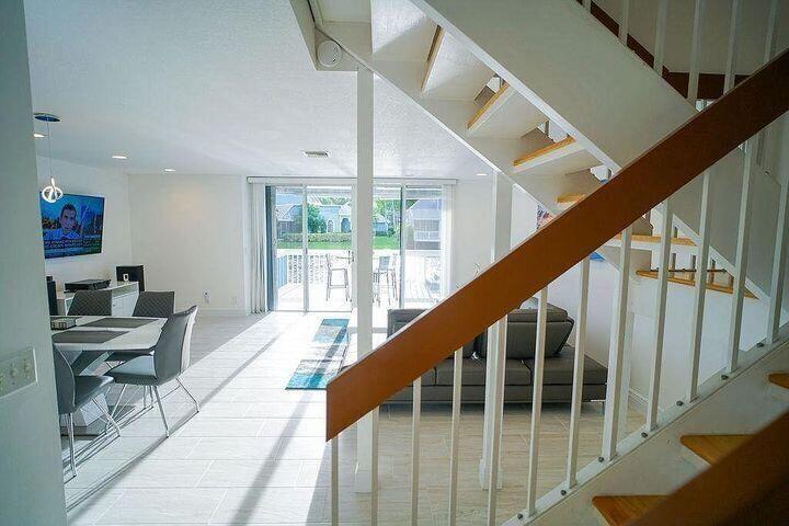 1511 Ocean Dunes Circle, Unit 1511 Jupiter, FL 33477 - Photo 8 of 27 a view of entryway and hall with wooden floor