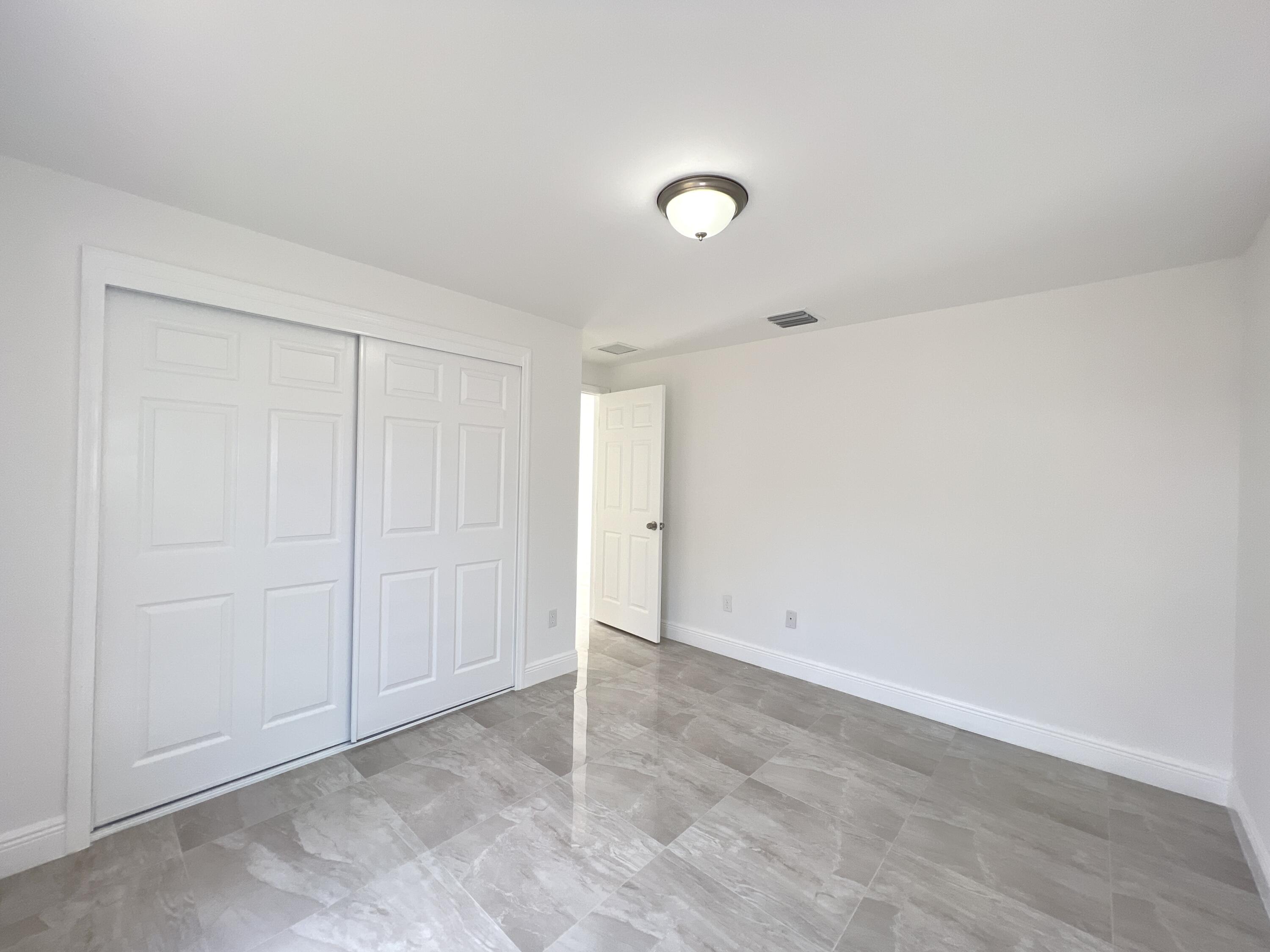 7838 Terrace Road Lake Worth, FL 33462 - Photo 35 of 61 DJI_20230423_135527_936