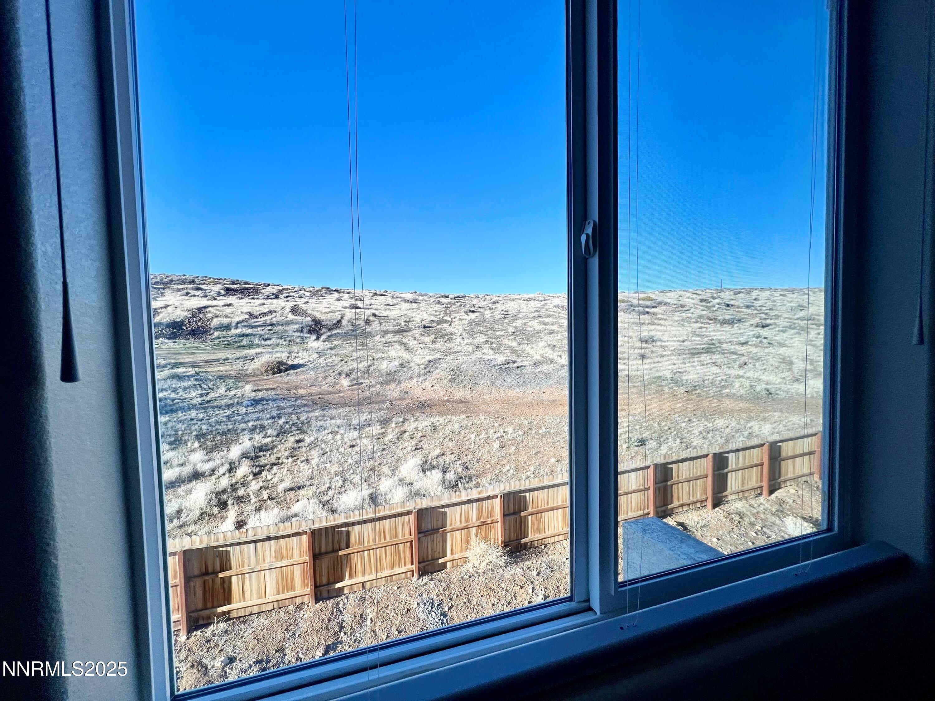 4969 Cavestone Road Sun Valley, NV 89433 - Photo 25 of 40 a view of a glass door