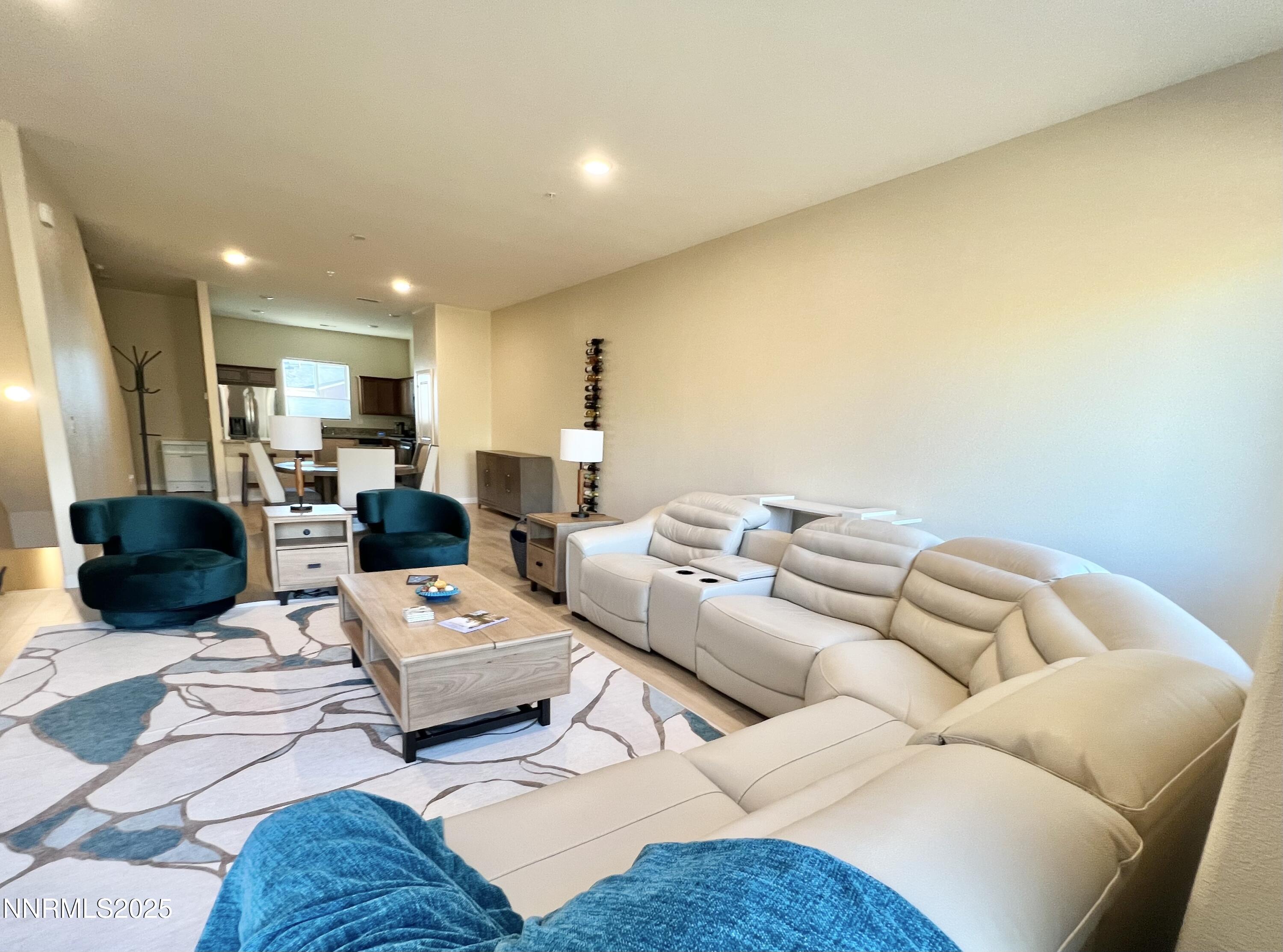 4969 Cavestone Road Sun Valley, NV 89433 - Photo 4 of 40 a living room with furniture