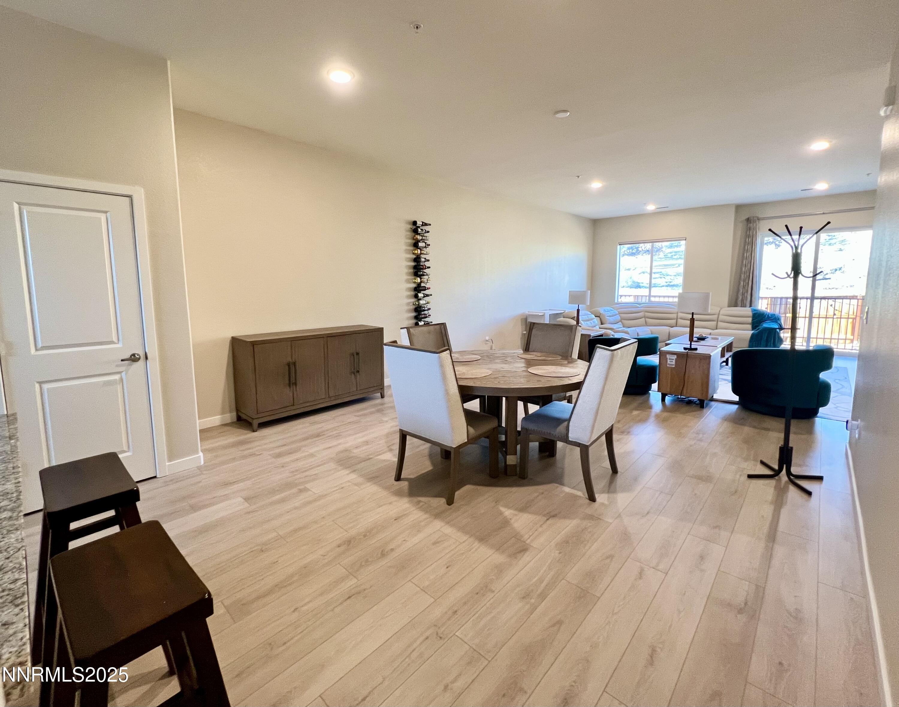 4969 Cavestone Road Sun Valley, NV 89433 - Photo 6 of 40 a view of a dining room with furniture