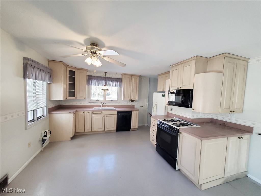 Eat-in kitchen with oak cabinets
