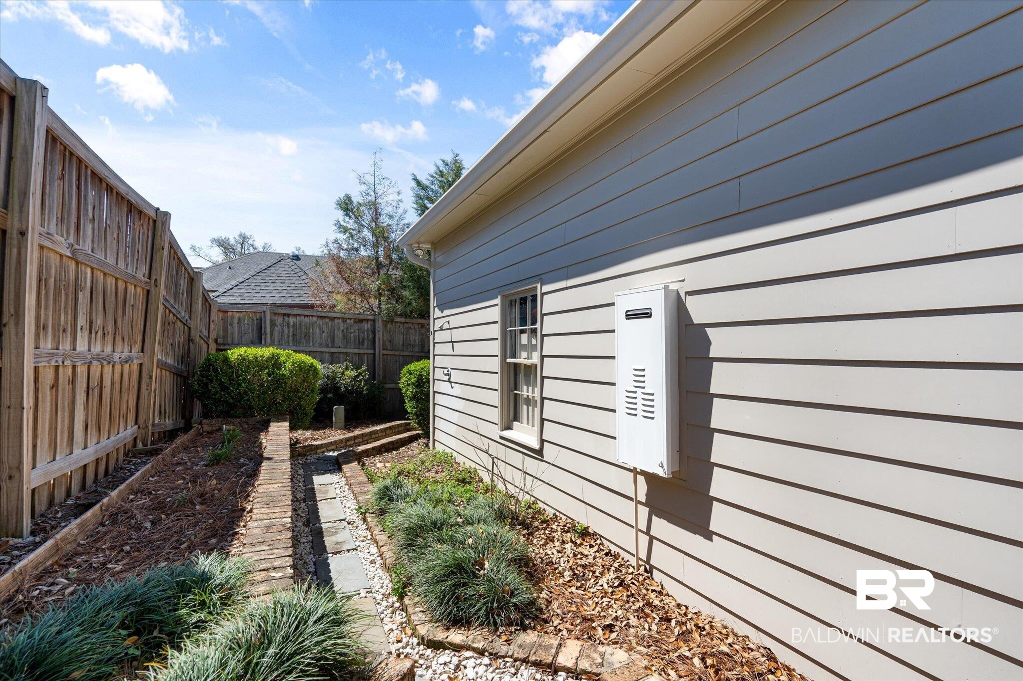 3921 McGregor Court Mobile, AL 36608 - Photo 35 of 41 View of side of home featuring a fenced backyard